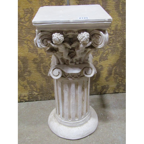 2125 - Pair of squat plaster cylindrical fluted columns with fixed caps, repeating winged cherub/putti deta... 