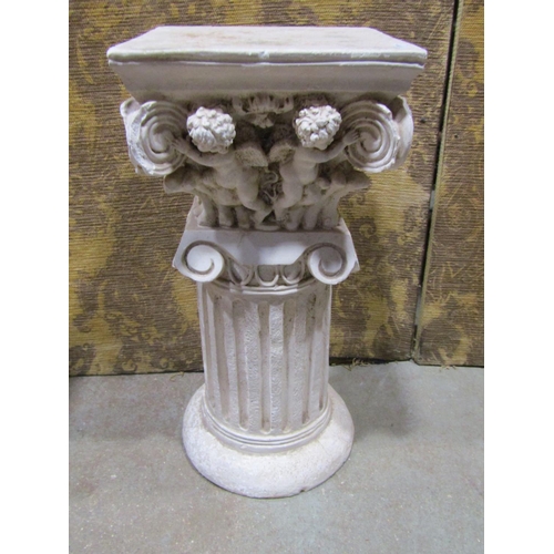 2125 - Pair of squat plaster cylindrical fluted columns with fixed caps, repeating winged cherub/putti deta... 