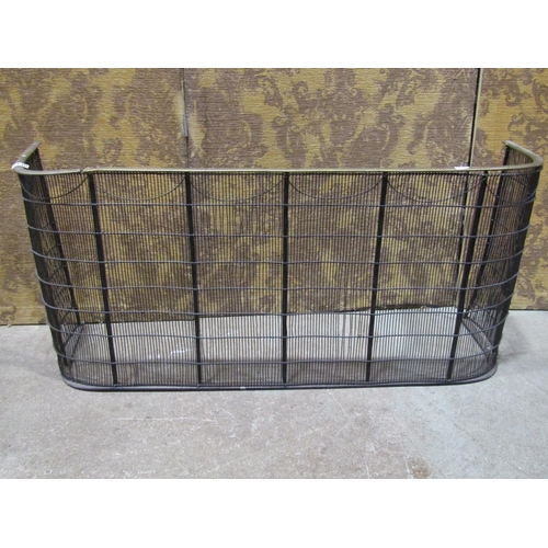 2130 - 19th century brass and wire fender with curved brass rail, 106cm wide x 46cm high (af)