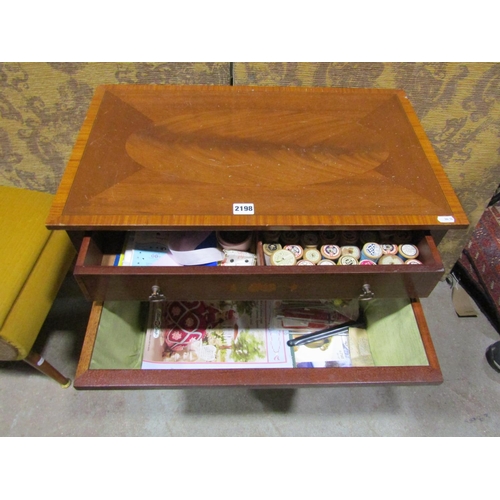 2198 - An inlaid Edwardian mahogany sewing table with cross banded detail and frieze drawer over a wool bag... 