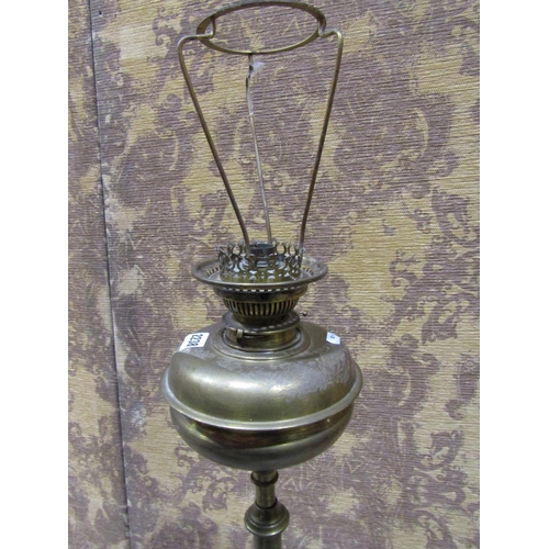 2238 - Art Nouveau brass telescopic oil lamp standard with simple tubular column, raised on whiplash suppor... 