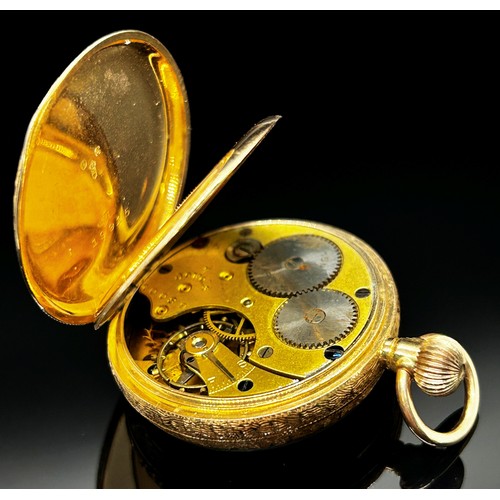 1442 - A small 12ct gold cased fob watch, the engraved dial with black Roman numerals, 30mm case enclosing ... 