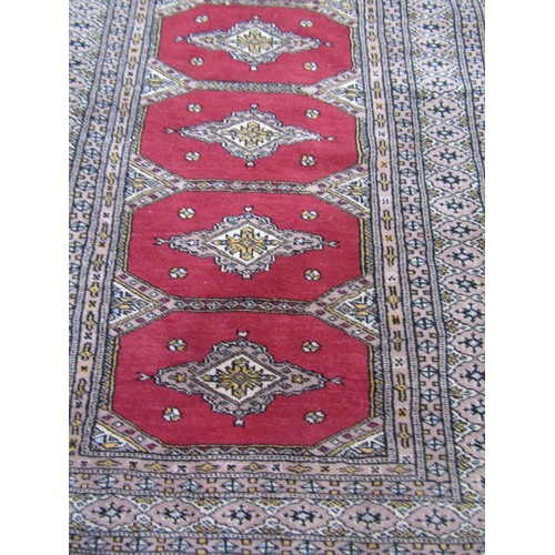 2711 - Two Middle Eastern type carpets with a panel of five divisions with a central medallion, 150cm x 90c... 