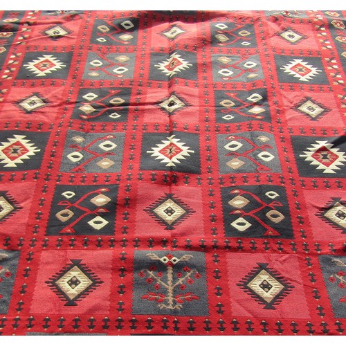 2719 - A contemporary reversible Turkish design Kilim type carpet with a bright red and blue square section... 