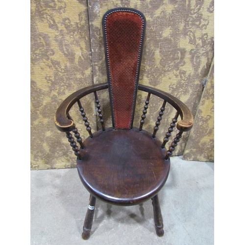 2196 - An Edwardian stained beechwood elbow chair with turned spindle back and solid dish seat