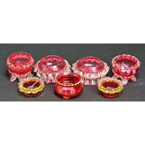 1124 - An assortment of 17 Victorian Cranberry glass condiments.