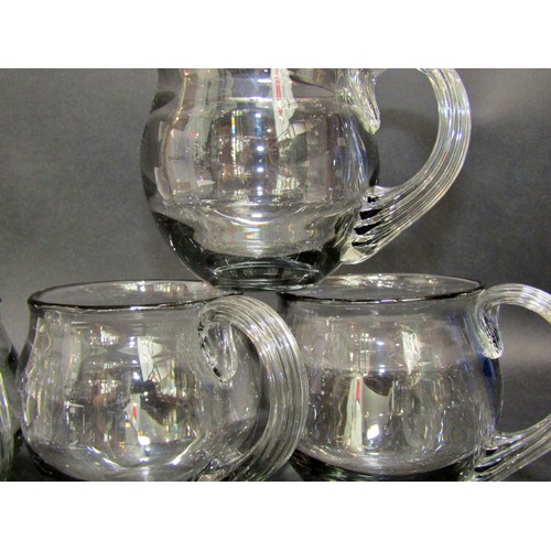 1146 - Four large, good quality hand blown smoked glass ale/beer mugs, each 10cm high, 9cm diameter