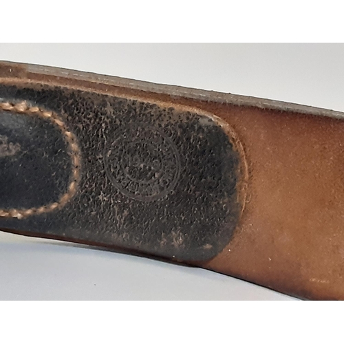 1776 - Heer belt with buckle and tab, the leather with makers mark and dated 1943