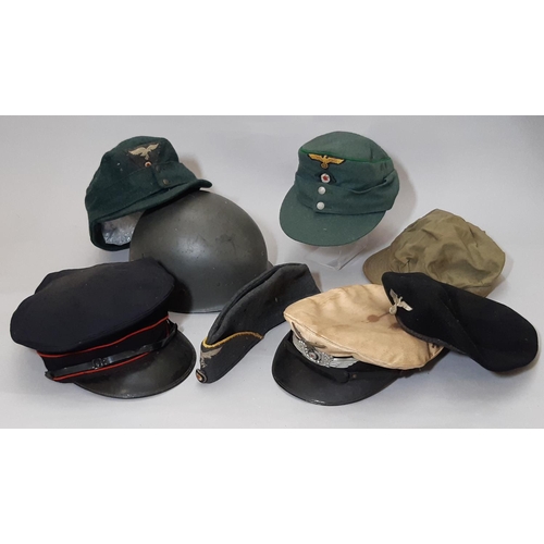 1793 - German beret with eagle cap badge and six other examples (7)