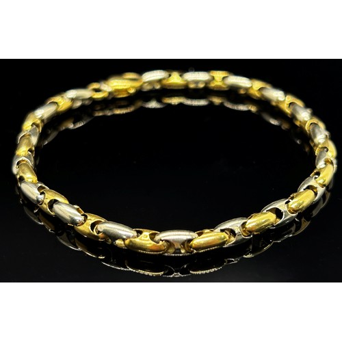 1383 - Chimento. A two tone 18ct yellow and white gold ‘Dominus’ necklace and bracelet pair, both marked Ch... 