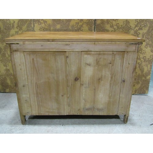 2223 - A continental oak arts and crafts style side cupboard, enclosed by a pair of carved panelled doors w... 