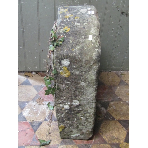 2109 - A weathered natural stone trough of rectangular form with D end, 62cm long x 46cm wide x 18cm deep