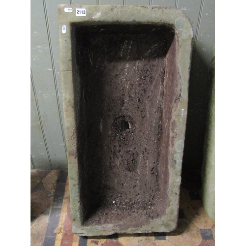 2112 - A shallow thick walled rectangular natural stone trough or sink with central drainage hole and singl... 