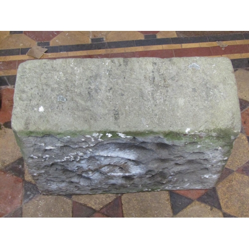 2113 - A weathered rectangular natural stone trough with canted interior, 54cm long x 39cm wide x 21cm deep