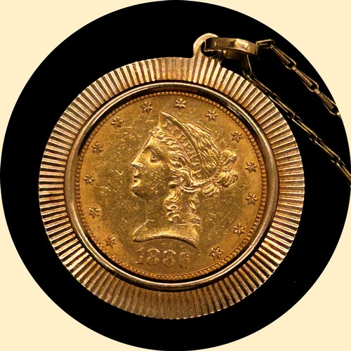 1375 - American Coinage. A mounted 1886 gold Ten Dollar coin, in an 18ct yellow gold mount and 18ct yellow ... 