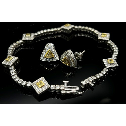 1367 - A demi-parure of 18ct white gold, white and yellow diamond jewellery, comprising bracelet and pair o... 