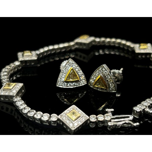 1367 - A demi-parure of 18ct white gold, white and yellow diamond jewellery, comprising bracelet and pair o... 