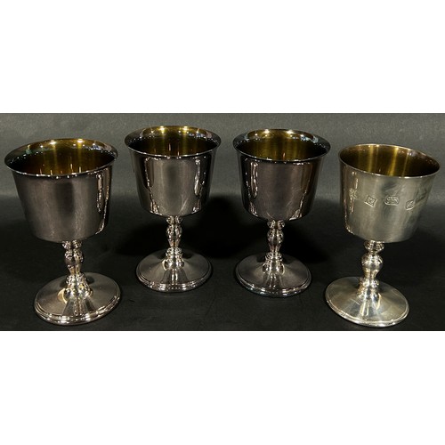 242 - Four silver gilt wine goblets, Birmingham, late 20th century, makers Barker Ellis Silver Company, 12... 