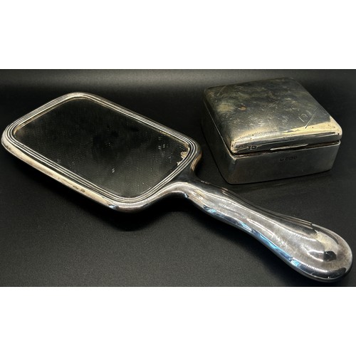 253 - A silver hand mirror and a silver cigarette box, both (af) (2)