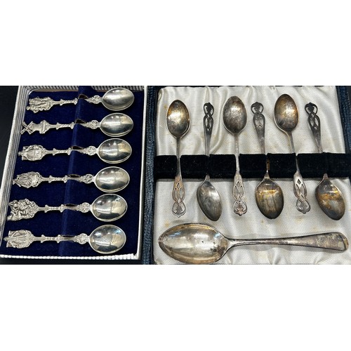 261 - A boxed set of six silver coffee spoons, a boxed set of six silver collectors spoons and a single si... 