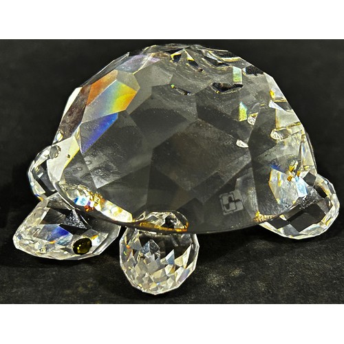 171 - A Swarovski crystal collection to include sea themed pieces comprising a turtle, shells, starfish, k... 