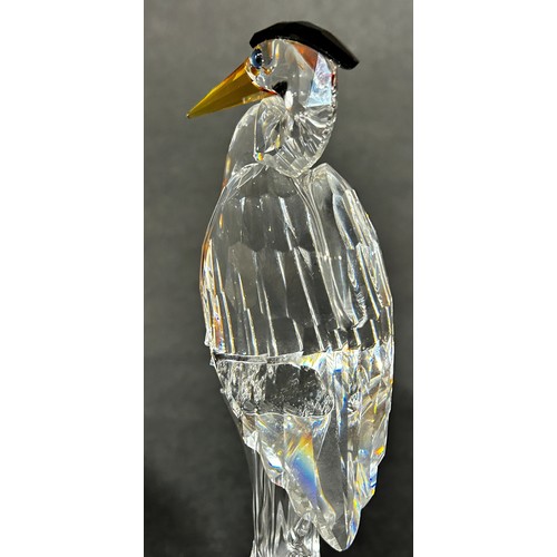 163 - Two Swarovski crystal animals a giraffe and a Heron, a further group of Swarovski miniature pieces w... 