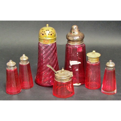 177 - A collection of Victorian Cranberry glass to include condiments, glass beakers, glasses, small bowls... 