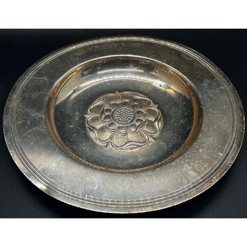 288 - A silver plate with central rose decoration, London 1968, maker Tessiers Ltd, 17 cm diameter, a silv... 