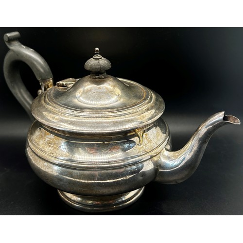 289 - A silver teapot, Birmingham 1931, handle as found, 13 ozs approximately