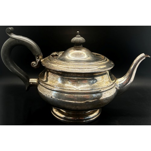 289 - A silver teapot, Birmingham 1931, handle as found, 13 ozs approximately