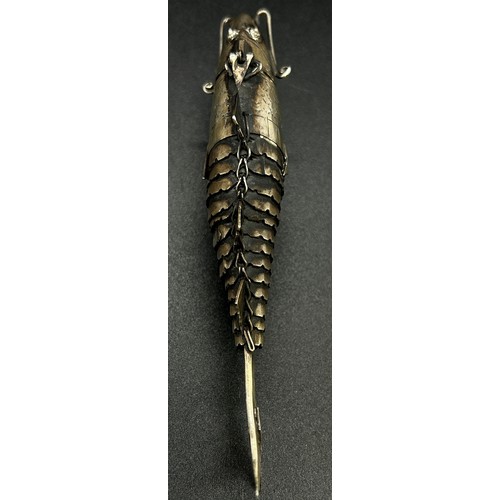 292 - A silver metal articulated fish 'pike', pill box with a hinged head, 12 cm long approximately