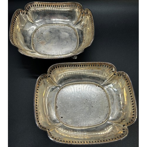 294 - A pair of silver bon bon dishes with pierced sides raised on pad feet, Sheffield 1919 makers Atkin B... 