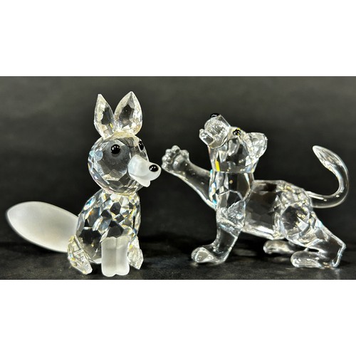 165 - Swarovski crystal ornaments including a mouse, a vase of roses, a row of three tulips, a petal head,... 