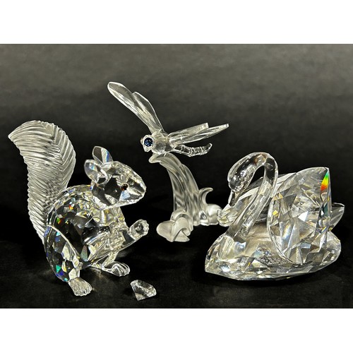 165 - Swarovski crystal ornaments including a mouse, a vase of roses, a row of three tulips, a petal head,... 