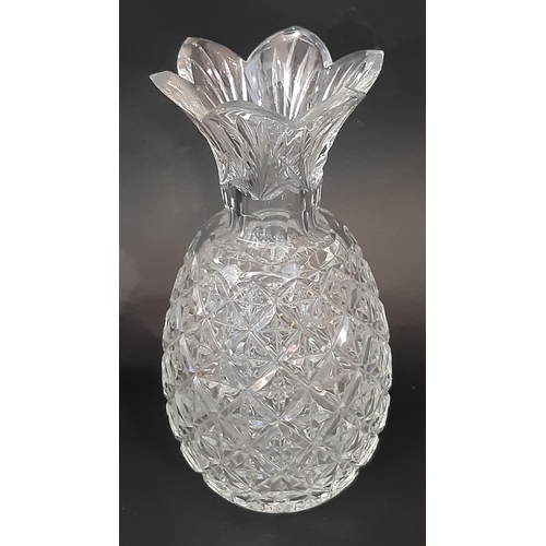 180 - A Waterford Crystal cut glass vase in the form of a pineapple, 30cm high, with its original box.