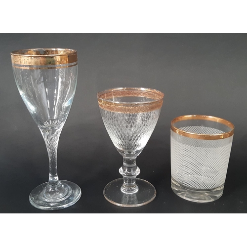 183 - Six gold rimmed wine glasses  on spiral stems, four engraved wine glasses with gold rims, together w... 