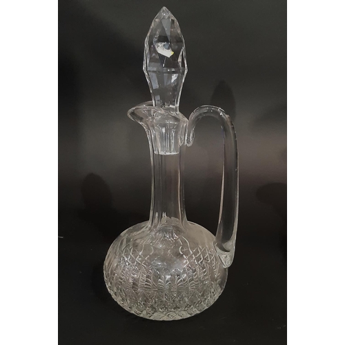 187 - A collection of late 19th and early 20th century cut glass decanters, of varying shapes and sizes, f... 