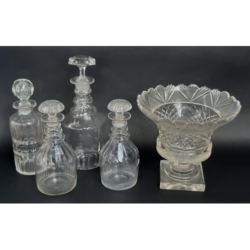 161 - Four 19th century glass decanters and cut glass rose bowl, raised on a square base 26cm diam x 23cm ... 