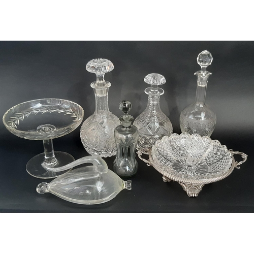 168 - Four 19th century cut glass decanters a cut glass fruit bowl raised on a silver plated stand, an ele... 