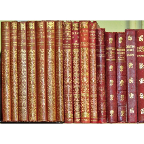 817 - Classic collection of small red bound editions of Charles Dickens (pre 1910), Thomas Hardy (1920s), ... 