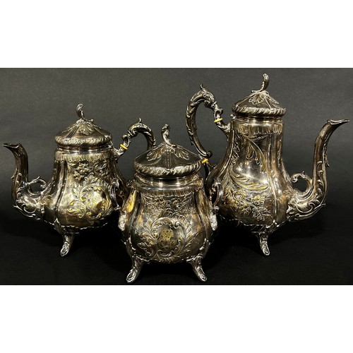 224 - A four piece French silver plate tea and coffee service, a single cream jug and a circular drinks tr... 