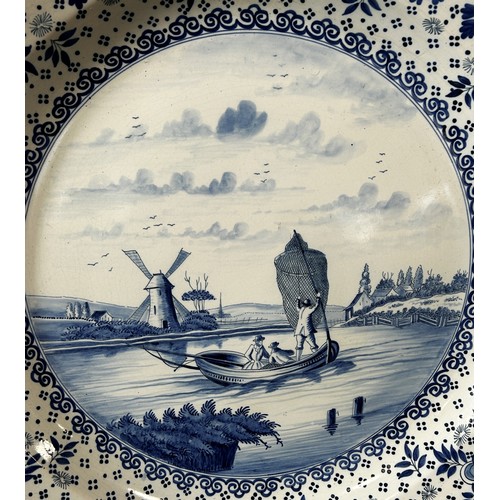 85 - Large Delft charger the central panel showing a fishing boat with distant landscape including a wind... 