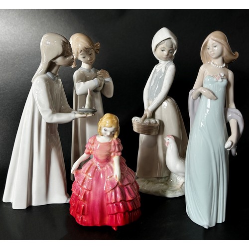 94 - Nine Goebel figures, A Royal Doulton 'Rose' figurine and four Lladro figures