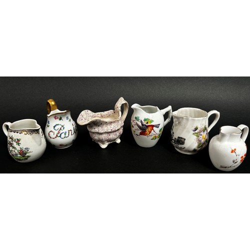 103 - Collection of 19th century and later miniature jugs by various factories (22)