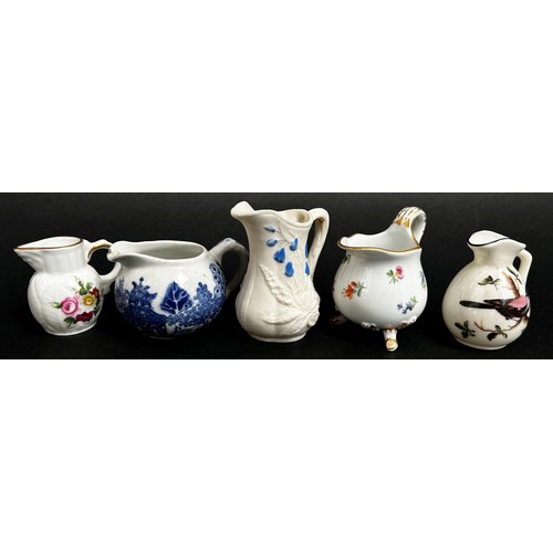 103 - Collection of 19th century and later miniature jugs by various factories (22)