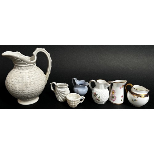 103 - Collection of 19th century and later miniature jugs by various factories (22)