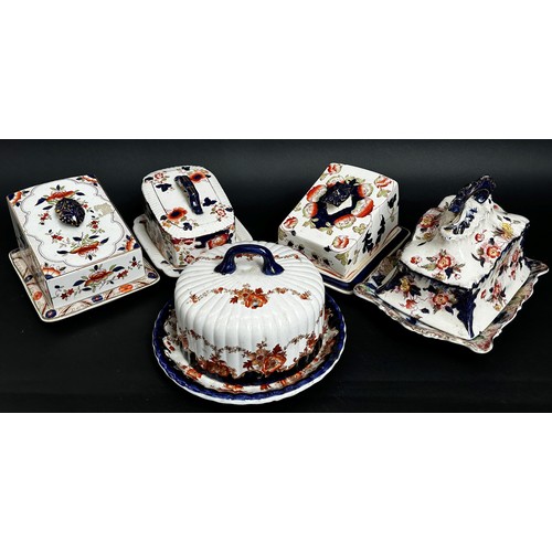 118 - Collection of 15 Victorian and Edwardian cheese dishes and covers all boldly decorated in a floral t... 