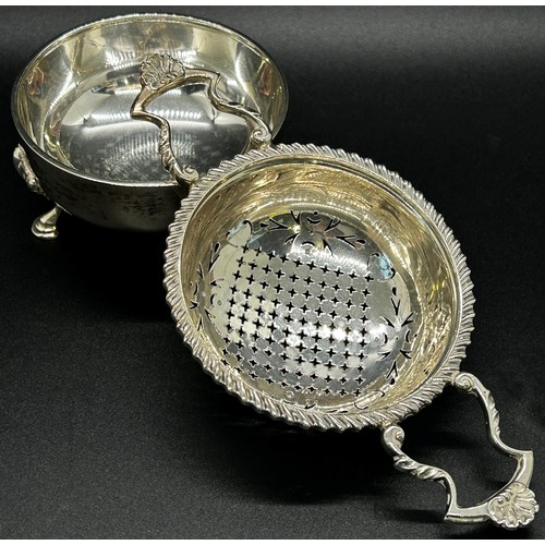 276 - A silver tea strainer on stand, Birmingham 1935 maker Adie Brothers Ltd, 14 cm wide, 3.5 oz approxim... 