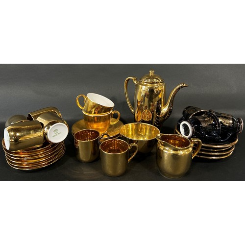 133 - Portmeirion Black and gold tea/coffee wares designed by Susan Williams-Ellis with Greek key and lion... 