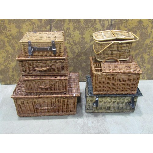 1068 - Seven contemporary wicker hampers of varying size and design